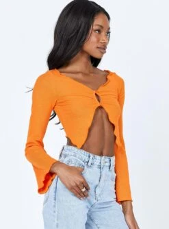 Princess Polly Harrison Long Sleeve Top Orange -Princess Polly Sales 3 modelinfo Tori US2 d7a4462b 9cd2 46b4 b59c ccfef9751ad9